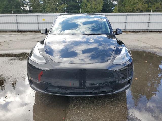 Photo 5 from auction – 2023 TESLA MODEL Y with VIN 7SAYGDEE3PF792640