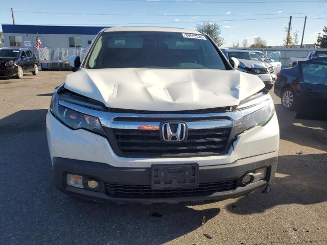 Photo 5 from auction – 2019 HONDA RIDGELINE with VIN 5FPYK3F56KB032576