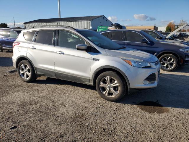 Photo 4 from auction – 2014 FORD ESCAPE SE with VIN 1FMCU9G90EUD95786