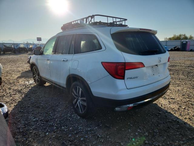Photo 2 from auction – 2017 HONDA PILOT TOUR with VIN 5FNYF6H94HB061937