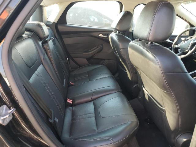 Photo 10 from auction – 2014 FORD FOCUS TITANIUM with VIN 1FADP3J2XEL161594