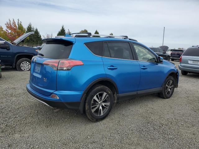 Photo 3 from auction – 2016 TOYOTA RAV4 XLE with VIN JTMRFREV5GJ060259