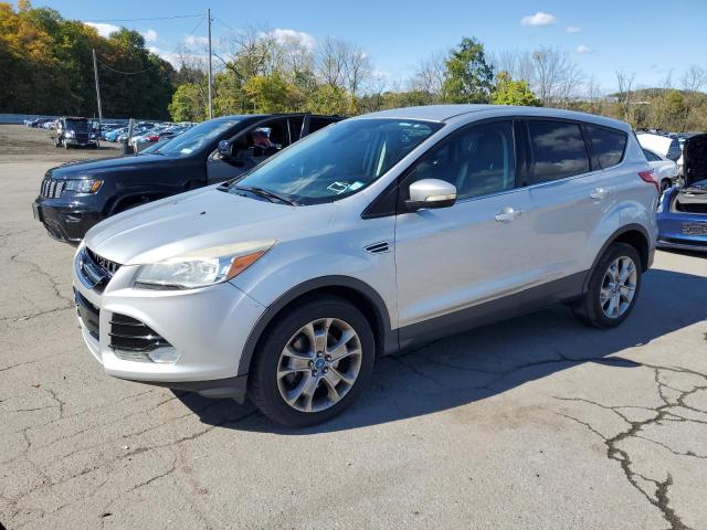 FORD ESCAPE SEL 2013 with VIN 1FMCU9H97DUB69967 - Photo from auction