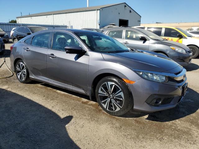 Photo 4 from auction – 2016 HONDA CIVIC EX with VIN 2HGFC1F40GH103394