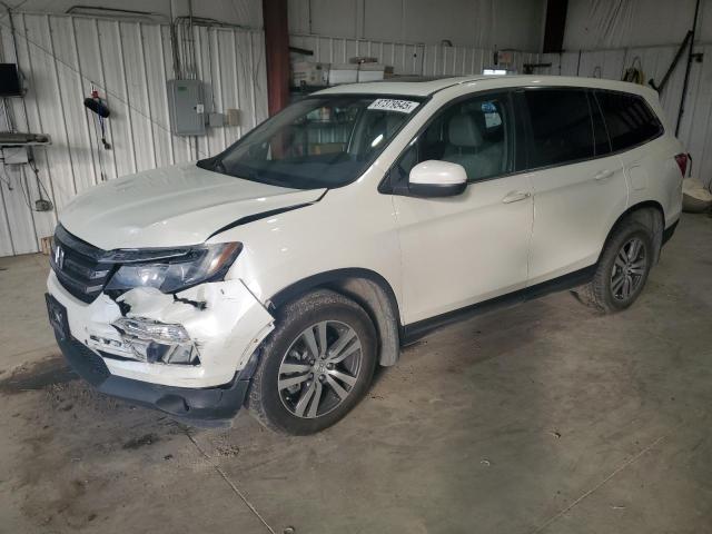 HONDA PILOT EXL 2016 with VIN 5FNYF6H5XGB054194 - Photo from auction
