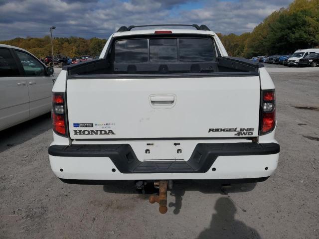 Photo 6 from auction – 2012 HONDA RIDGELINE with VIN 5FPYK1F51CB456821