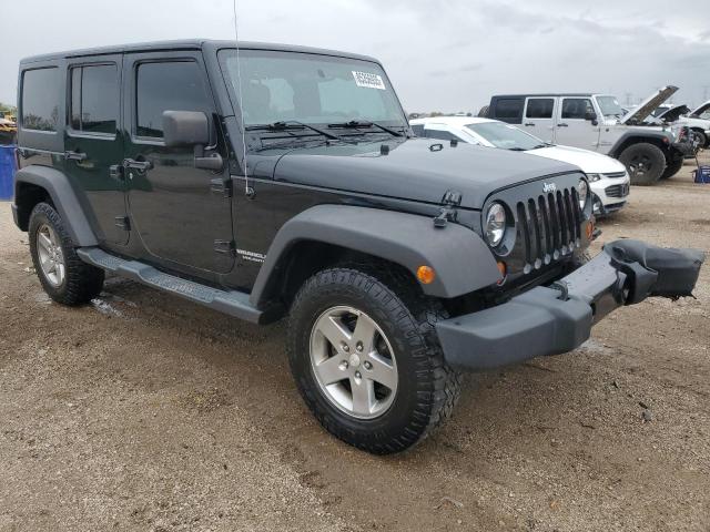 Photo 4 from auction – 2011 JEEP WRANGLER U with VIN 1J4BA6H19BL549049