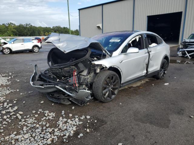 TESLA MODEL X 2018 with VIN 5YJXCDE26JF109587 - Photo from auction