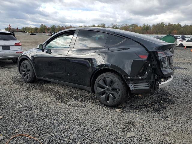 Photo 2 from auction – 2025 TESLA MODEL Y with VIN 7SAYGDEE4SF298795