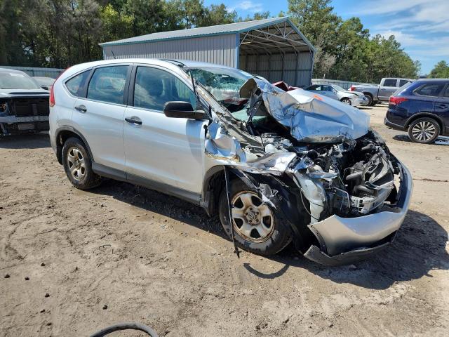 Photo 4 from auction – 2014 HONDA CR-V LX with VIN 2HKRM3H33EH556258