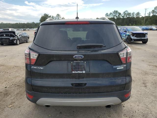 Photo 6 from auction – 2017 FORD ESCAPE TITANIUM with VIN 1FMCU0JD0HUE52386