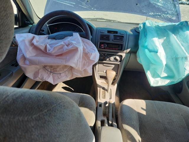 Photo 8 from auction – 1999 TOYOTA COROLLA VE with VIN 2T1BR12E9XC127455