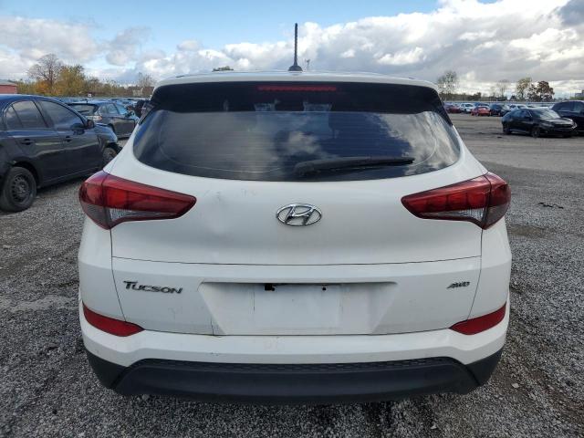 Photo 6 from auction – 2017 HYUNDAI TUCSON SE with VIN KM8J2CA47HU559613