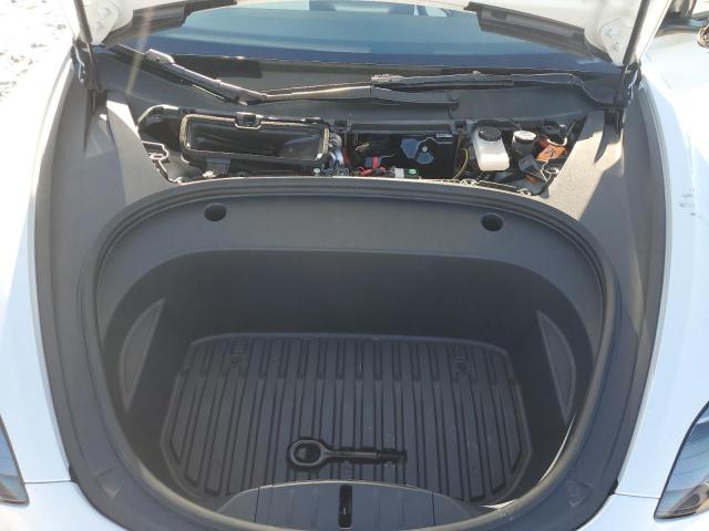 Photo 11 from auction – 2022 TESLA MODEL 3 with VIN 5YJ3E1EA0NF320336