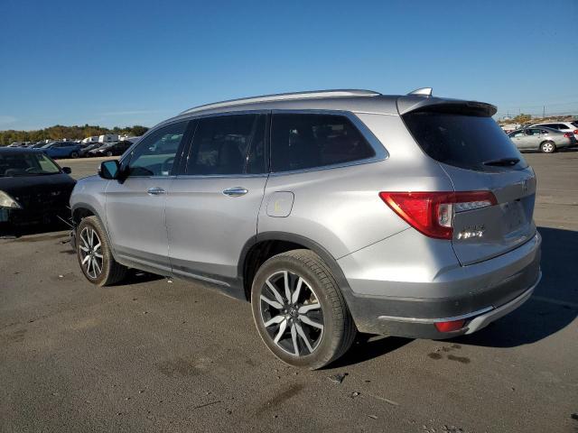 Photo 2 from auction – 2022 HONDA PILOT TOUR with VIN 5FNYF6H6XNB078968