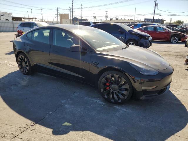 Photo 4 from auction – 2022 TESLA MODEL 3 with VIN 5YJ3E1EC3NF122917