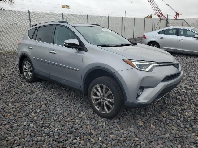 Photo 4 from auction – 2018 TOYOTA RAV4 LIMIT with VIN 2T3DFREV3JW763524