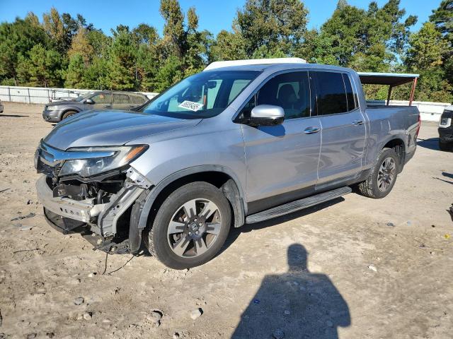 HONDA RIDGELINE 2017 with VIN 5FPYK3F7XHB002068 - Photo from auction