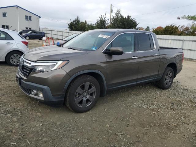 HONDA RIDGELINE 2020 with VIN 5FPYK3F71LB007491 - Photo from auction