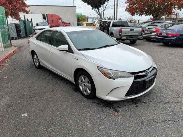 TOYOTA CAMRY HYBR 2015 with VIN 4T1BD1FK3FU168482 - Photo from auction