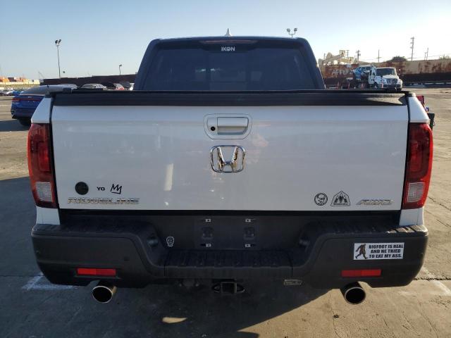 Photo 6 from auction – 2023 HONDA RIDGELINE with VIN 5FPYK3F89PB001372