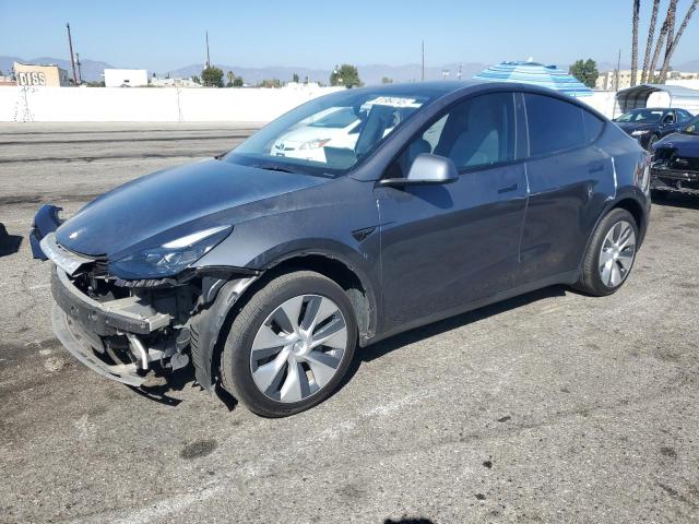 TESLA MODEL Y 2023 with VIN 7SAYGDEE4PF624909 - Photo from auction