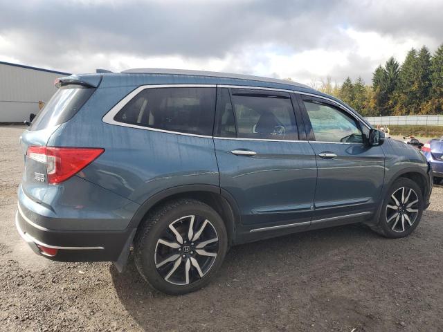 Photo 3 from auction – 2021 HONDA PILOT TOURING with VIN 5FNYF6H67MB080353