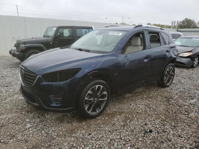 MAZDA CX-5 GT 2016 with VIN JM3KE4DYXG0861267 - Photo from auction