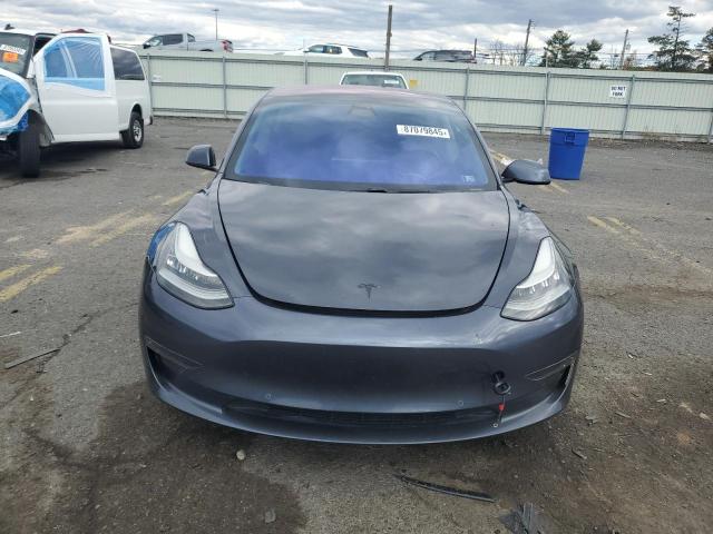Photo 5 from auction – 2018 TESLA MODEL 3 with VIN 5YJ3E1EA1JF024056