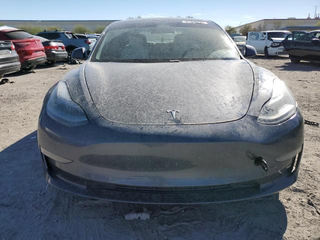 Photo 5 from auction – 2021 TESLA MODEL 3 with VIN 5YJ3E1EA7MF025863