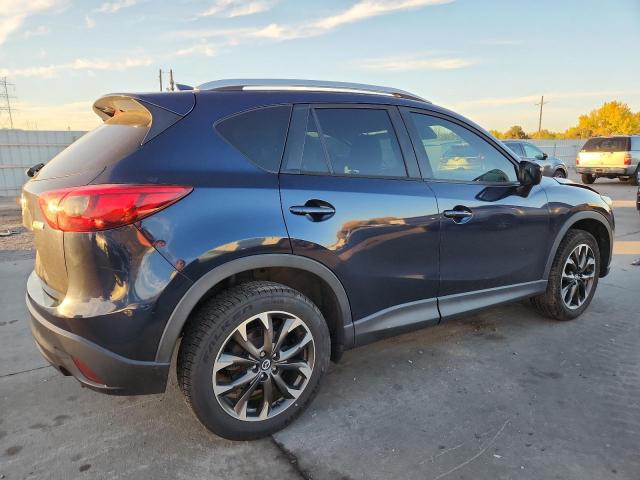 Photo 3 from auction – 2016 MAZDA CX-5 GT with VIN JM3KE2DY8G0668071