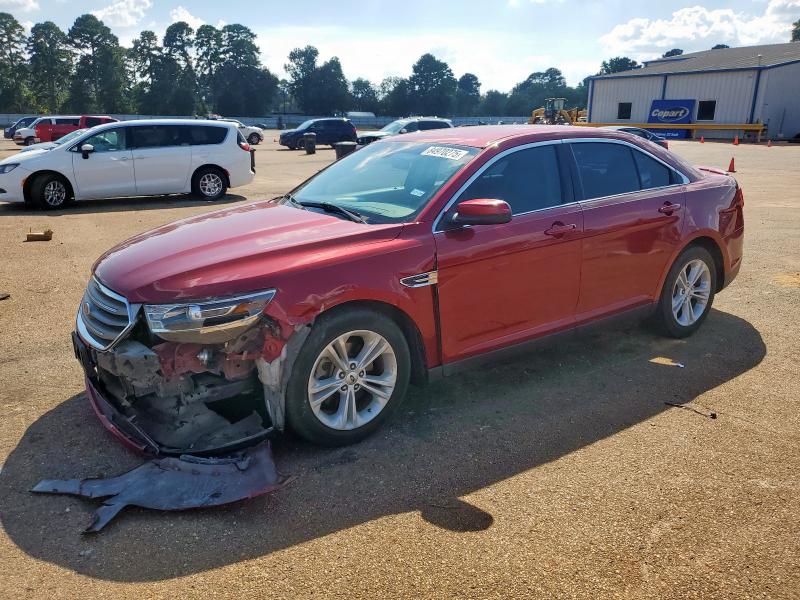 FORD TAURUS SEL 2016 with VIN 1FAHP2E8XGG102163 - Photo from auction
