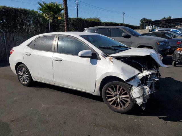 Photo 4 from auction – 2014 TOYOTA COROLLA L with VIN 5YFBURHE4EP096309