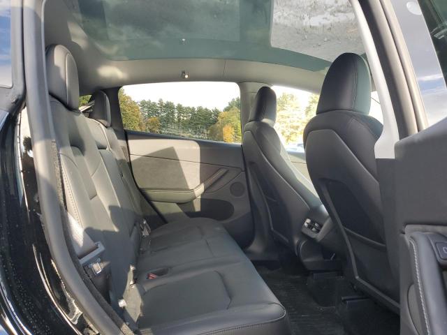 Photo 11 from auction – 2025 TESLA MODEL Y with VIN 7SAYGDEE6SA351624