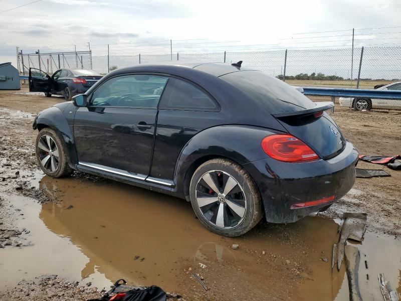 Photo 2 from auction – 2014 VOLKSWAGEN BEETLE TUR with VIN 3VWVS7AT2EM615023
