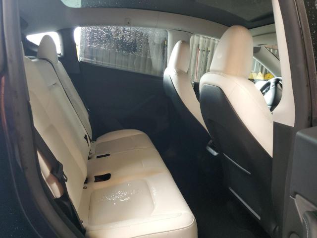 Photo 11 from auction – 2023 TESLA MODEL Y with VIN 7SAYGDEE9PF815046