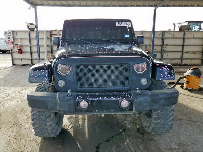 Photo 5 from auction – 2014 JEEP WRANGLER U with VIN 1C4HJWEG6EL181765