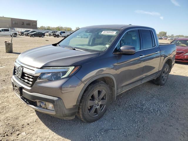 HONDA RIDGELINE 2020 with VIN 5FPYK3F78LB010131 - Photo from auction