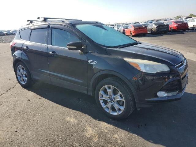 Photo 4 from auction – 2014 FORD ESCAPE TIT with VIN 1FMCU0J97EUC03168