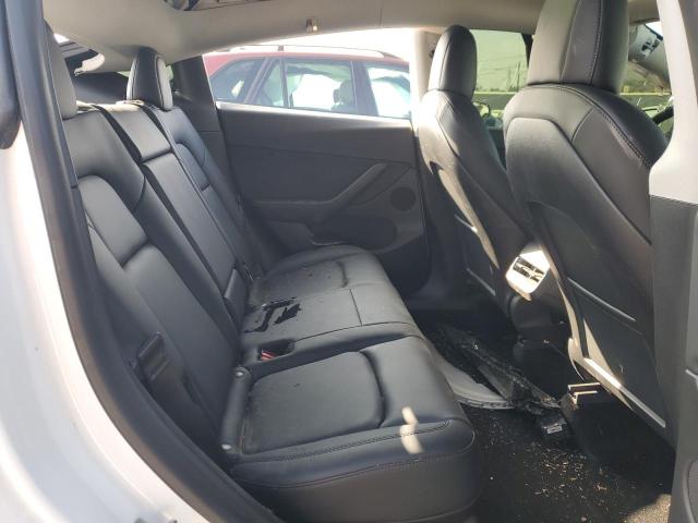 Photo 11 from auction – 2022 TESLA MODEL Y with VIN 7SAYGDEE7NF353650