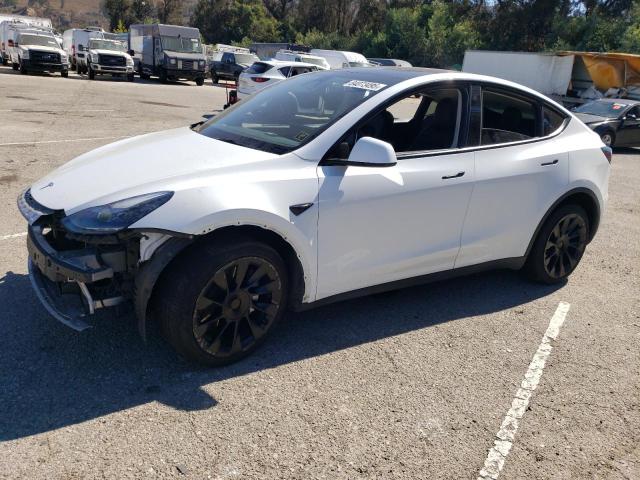TESLA MODEL Y 2023 with VIN 7SAYGAEE9PF634799 - Photo from auction