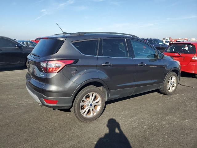 Photo 3 from auction – 2018 FORD ESCAPE with VIN 1FMCU9GD3JUA44000