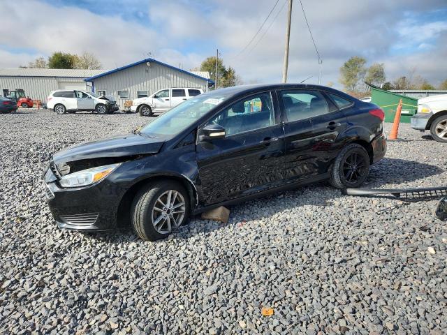 FORD FOCUS SE 2017 with VIN 1FADP3FE2HL292591 - Photo from auction