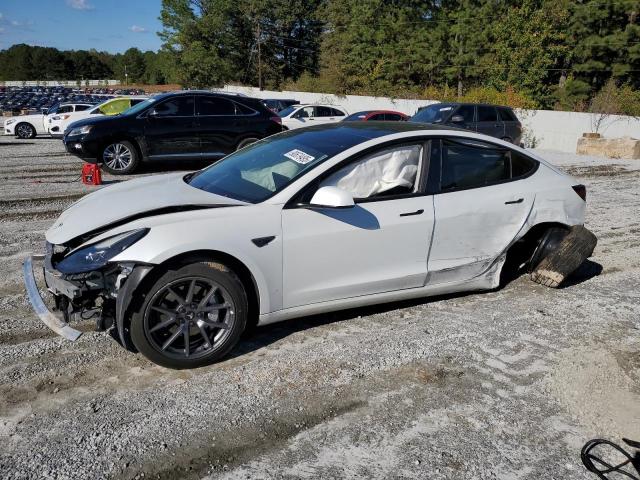 TESLA MODEL 3 2021 with VIN 5YJ3E1EA0MF051740 - Photo from auction