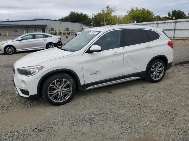 BMW X1 XDRIVE2 2016 with VIN WBXHT3C32GP889552 - Photo from auction