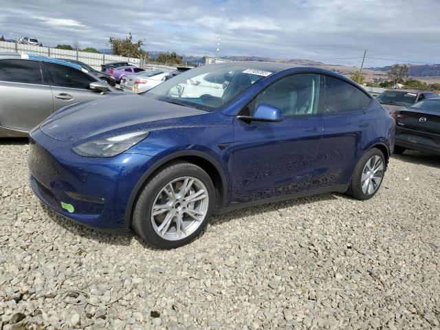 TESLA MODEL Y 2023 with VIN 7SAYGAEE3PF604830 - Photo from auction