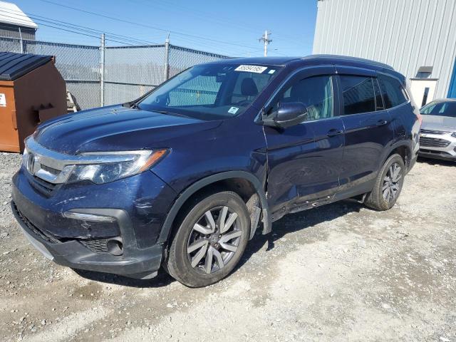 HONDA PILOT BLAC 2022 with VIN 5FNYF6H79NB501421 - Photo from auction