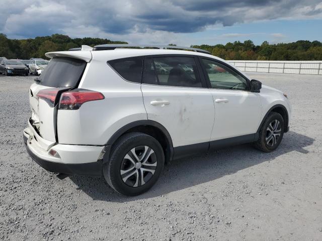 Photo 3 from auction – 2017 TOYOTA RAV4 LE with VIN JTMZFREV6HJ721556