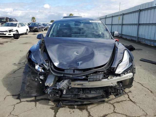 Photo 5 from auction – 2023 TESLA MODEL 3 with VIN 5YJ3E1EB6PF703290