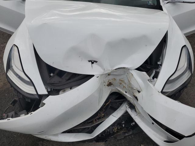 Photo 11 from auction – 2018 TESLA MODEL 3 with VIN 5YJ3E1EB1JF108497